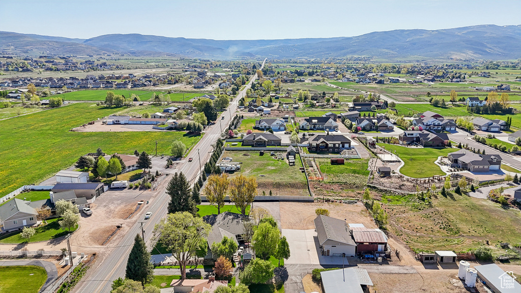 View of property location with nearby suburban area and a mountainous background