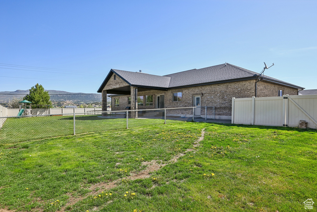 View of yard with a mountain view