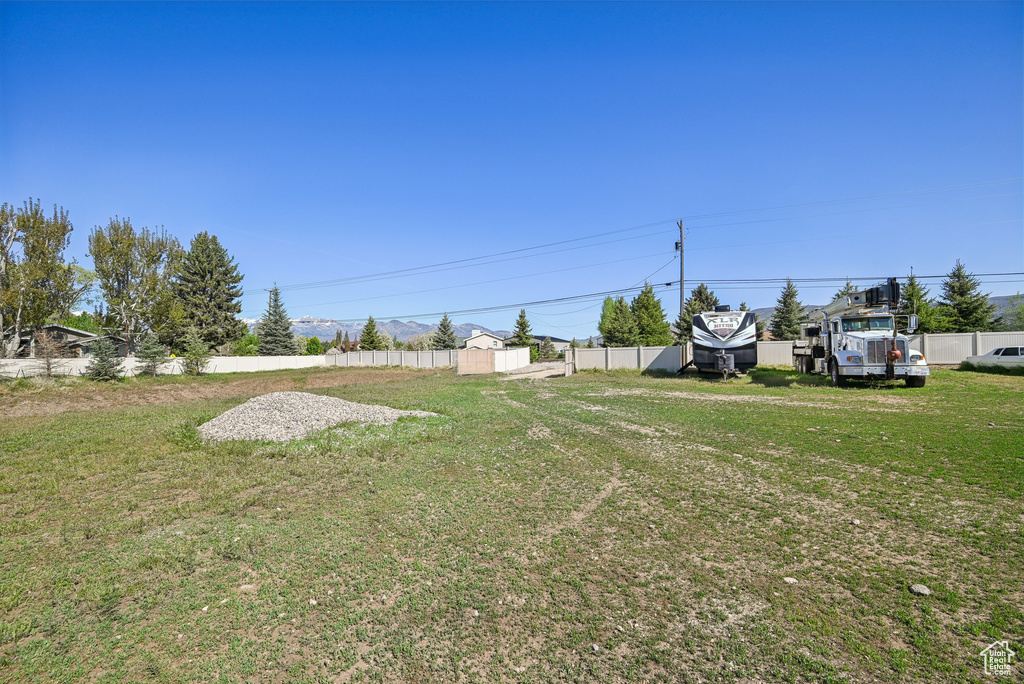 View of yard with a shed