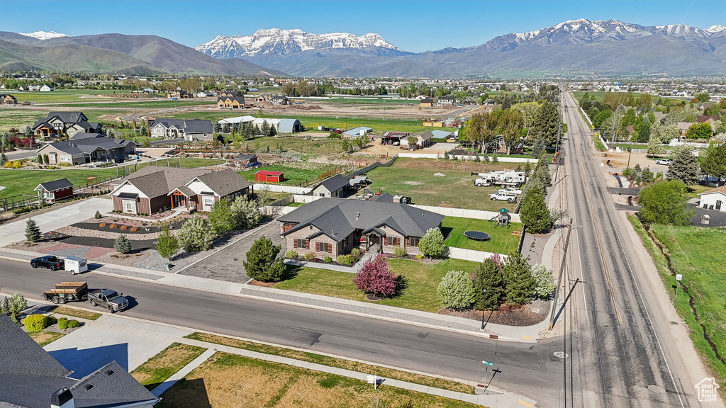 Aerial view of residential area featuring mountains