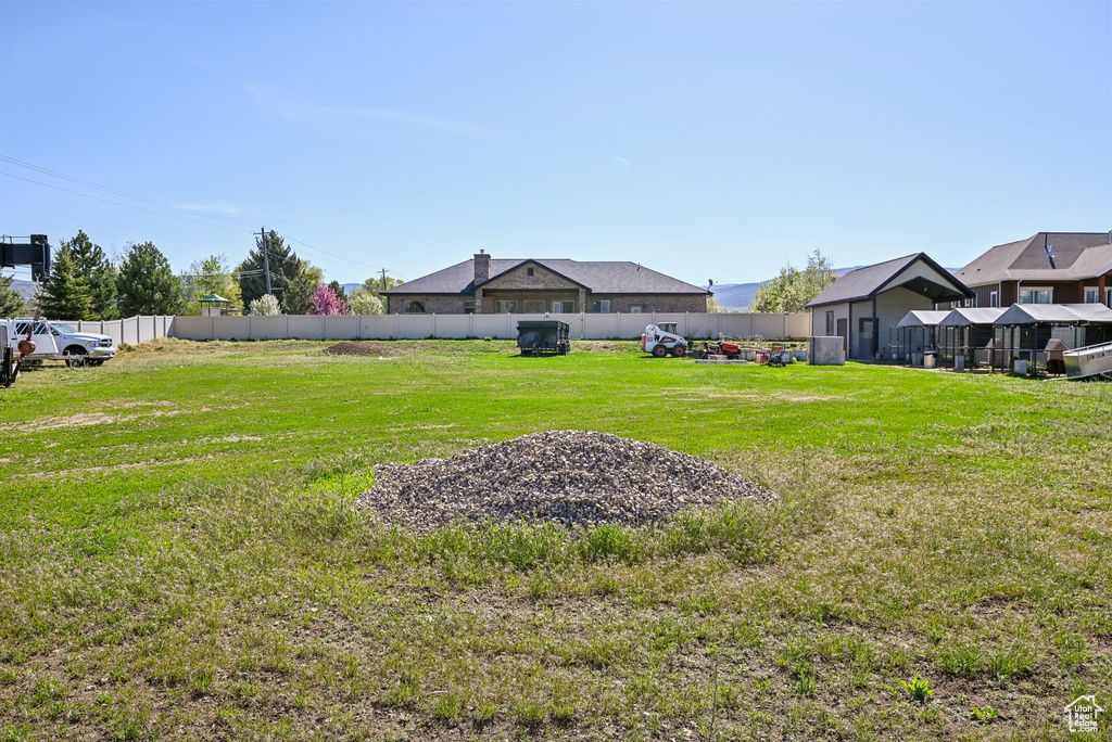 View of yard with fence