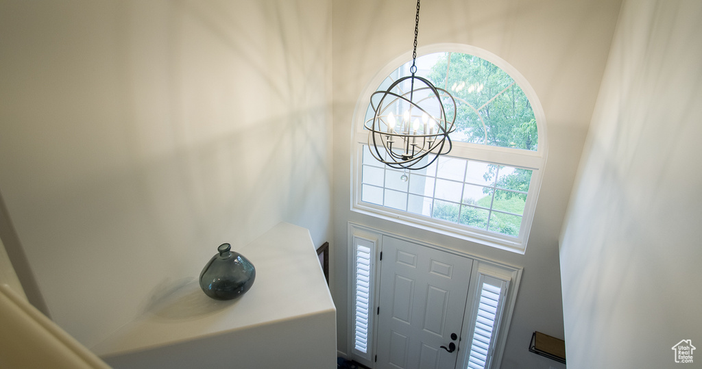 Entrance foyer featuring a chandelier