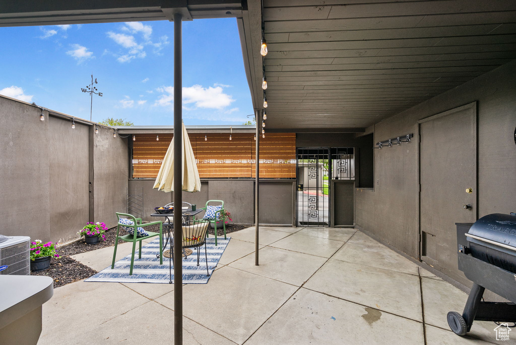 View of patio with cooling unit