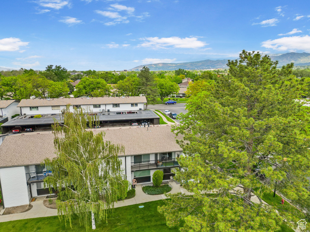 Aerial view of residential area with a mountain backdrop