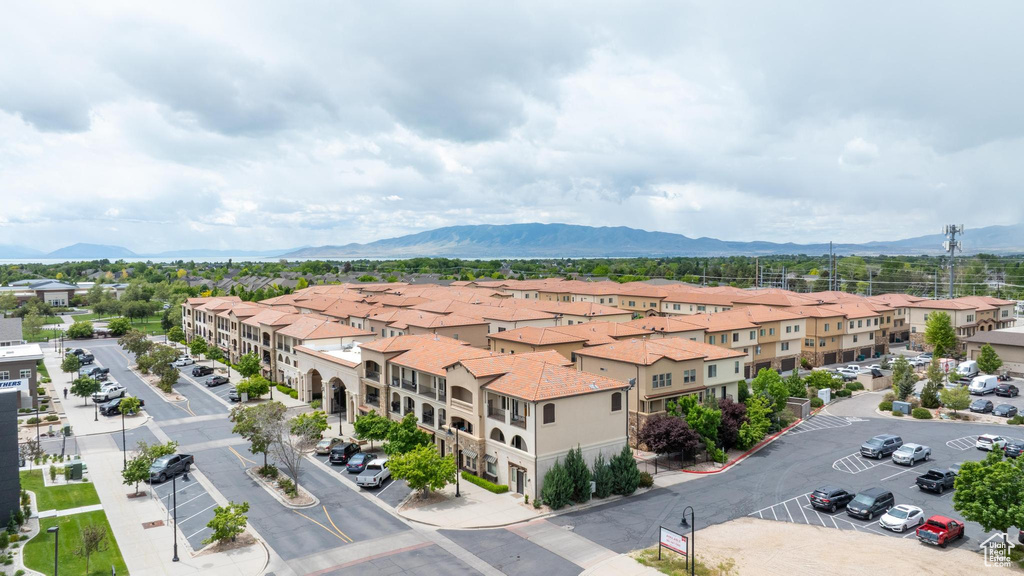 Aerial view of residential area with a mountainous background