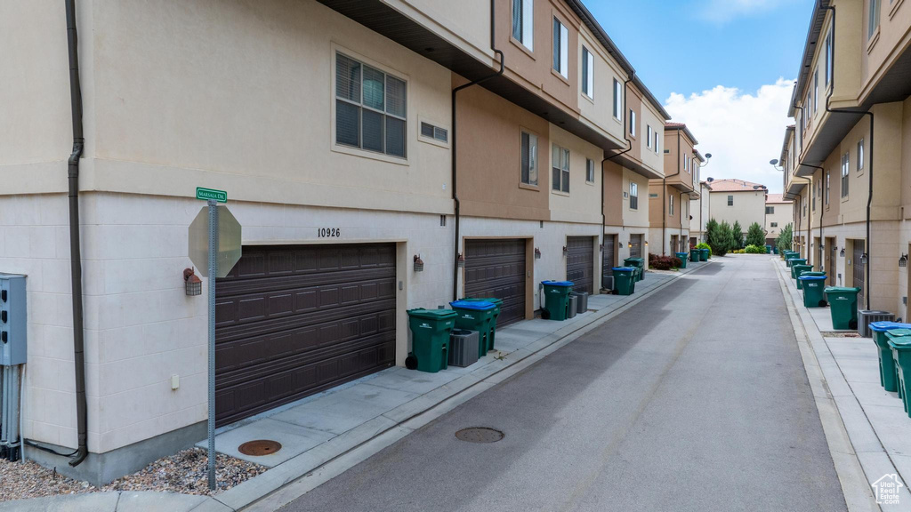 View of street featuring a residential view and curbs