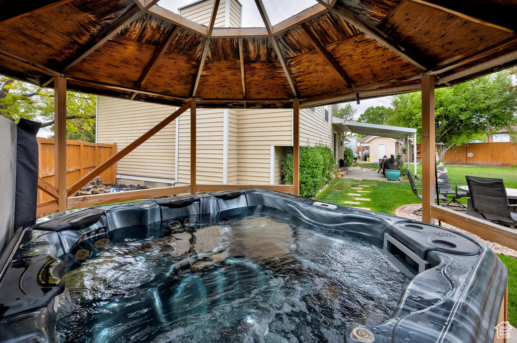 View of patio / terrace with a gazebo and a hot tub