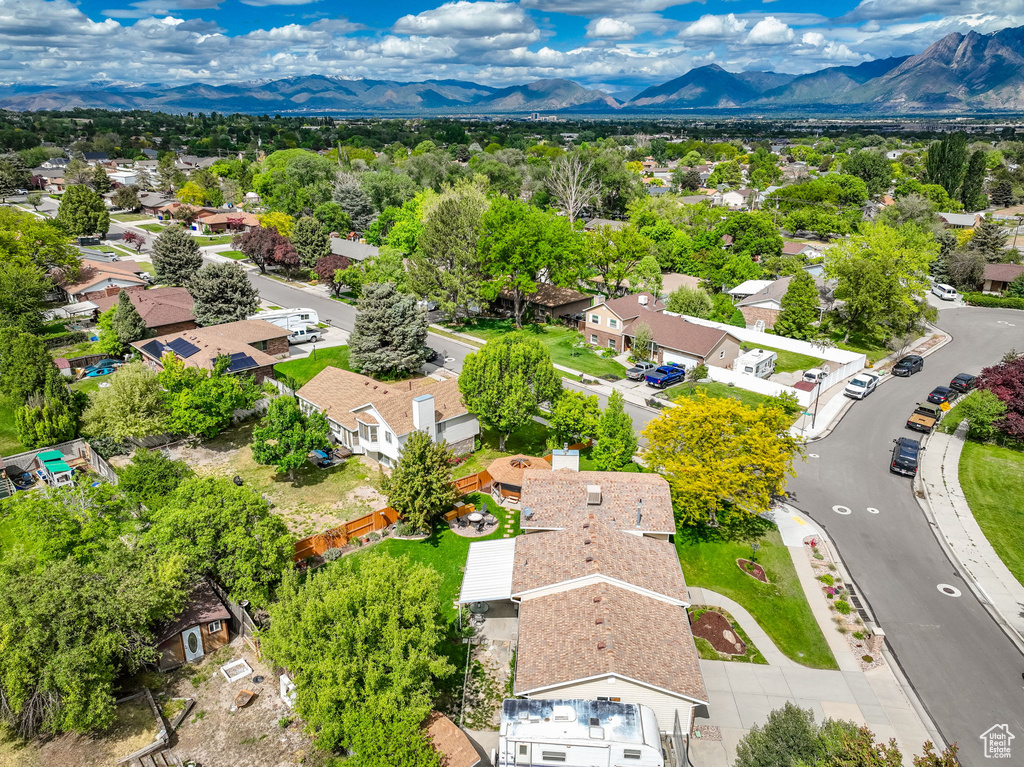 Aerial view of residential area with mountains