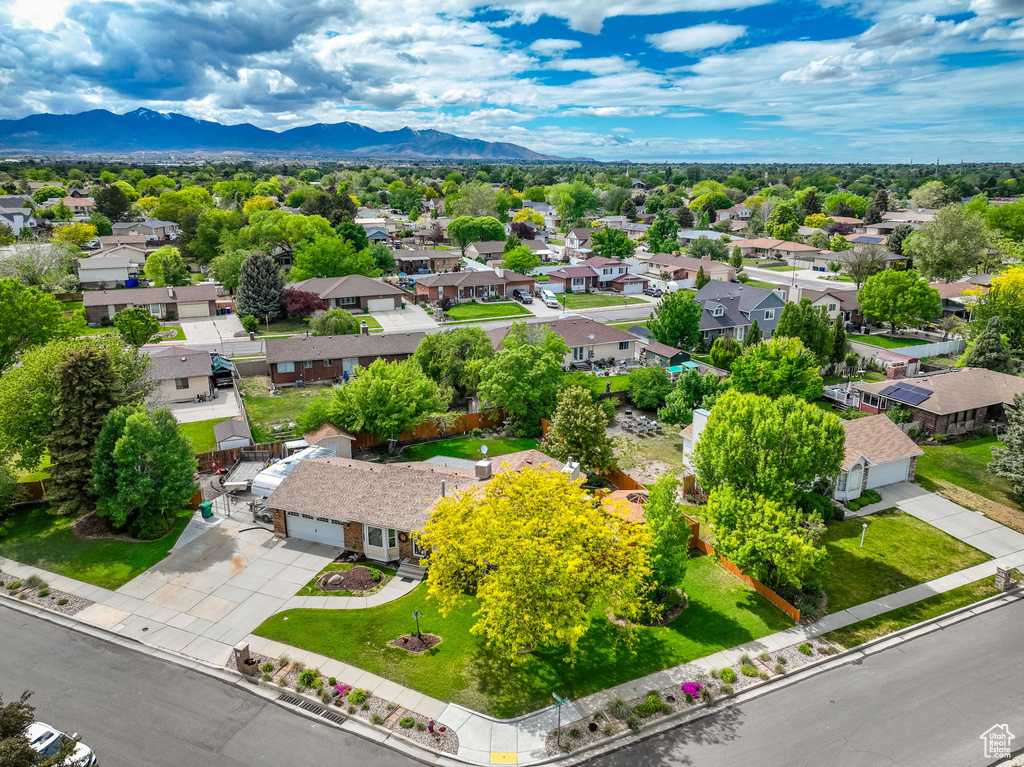 Aerial view of residential area with a mountain backdrop