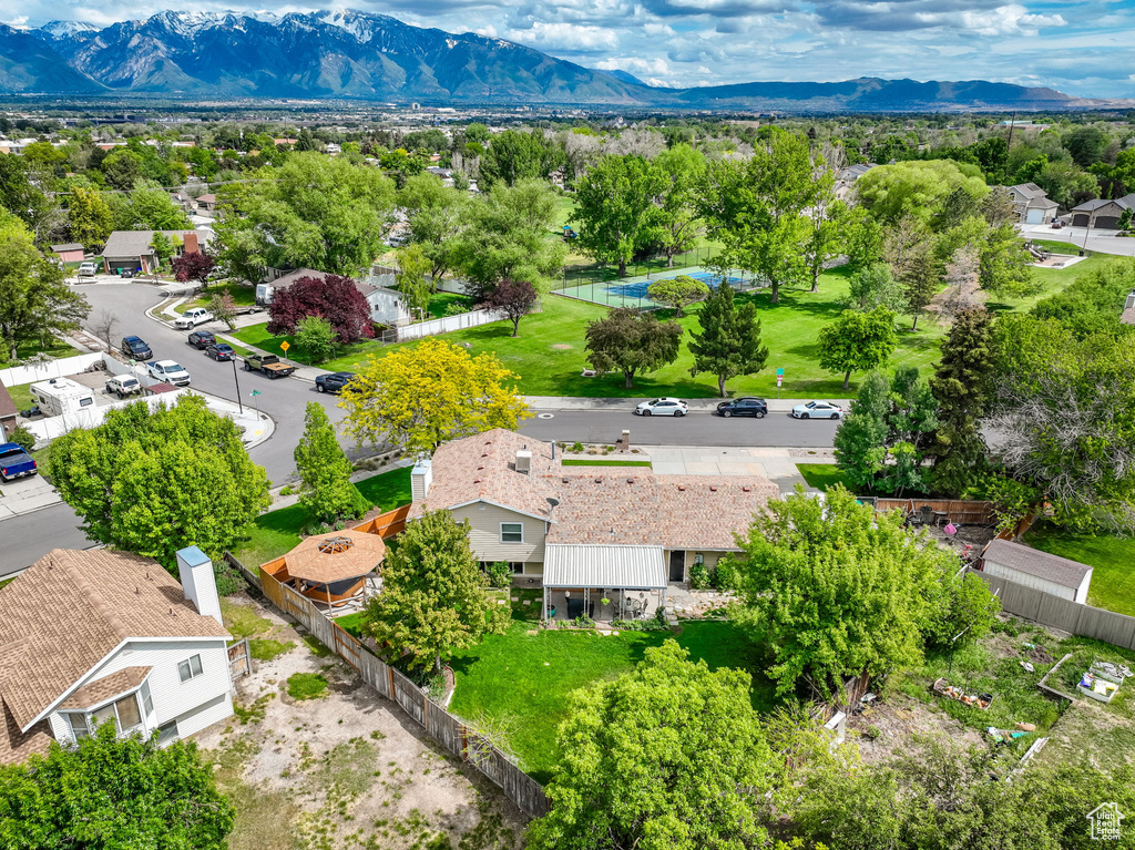 Aerial view of residential area featuring mountains