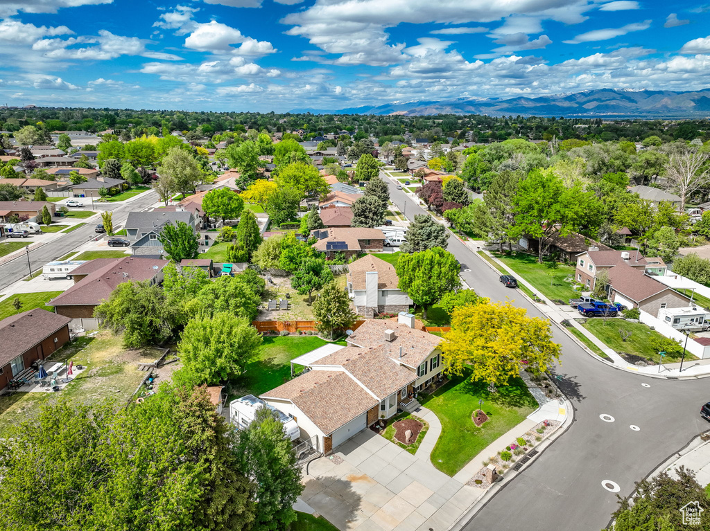 Aerial view of residential area featuring mountains
