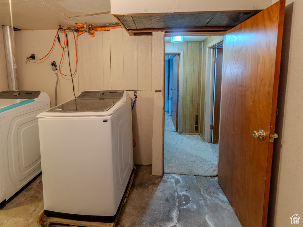 Washroom featuring washer and dryer