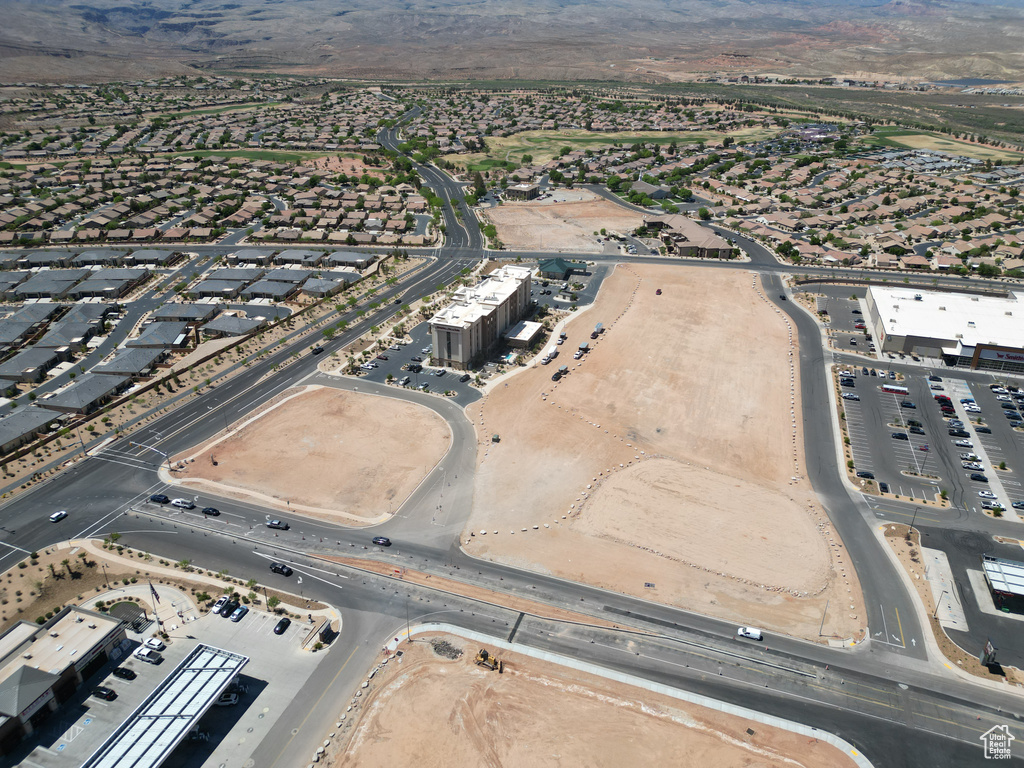 Aerial view of property's location featuring mountains