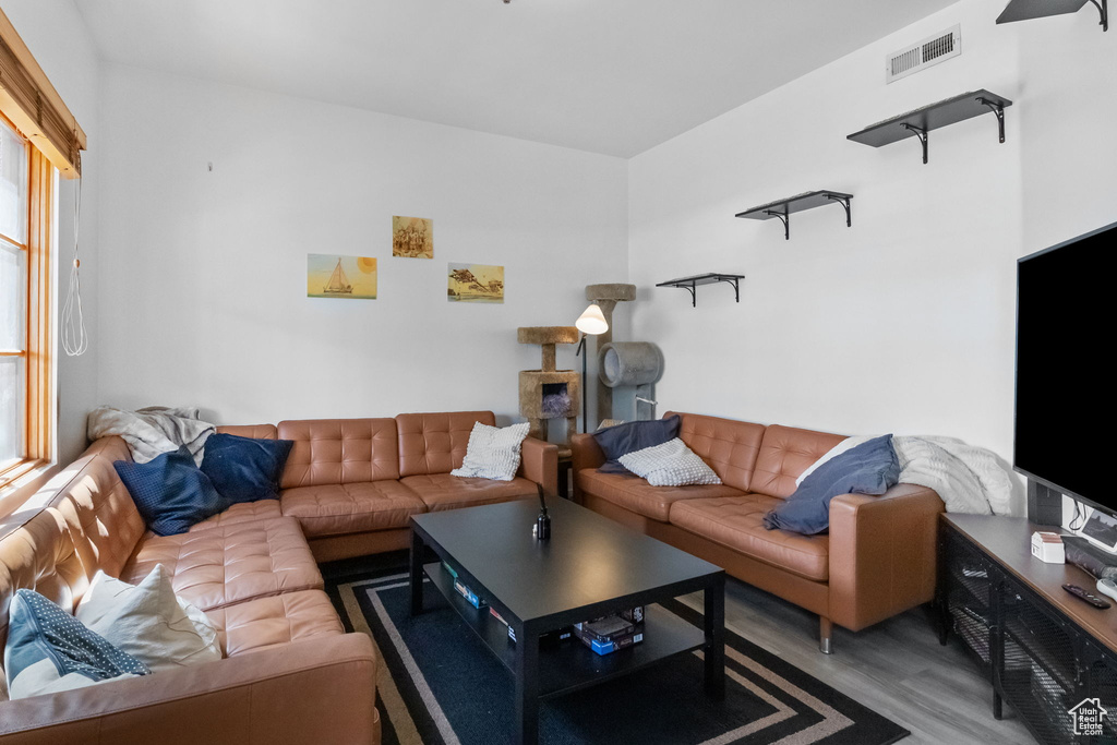 Living area with wood finished floors