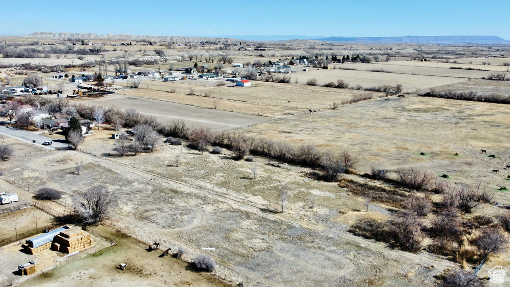 View of rural area featuring a desert landscape and mountains