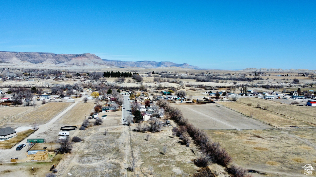 Overview of rural landscape with a mountain backdrop