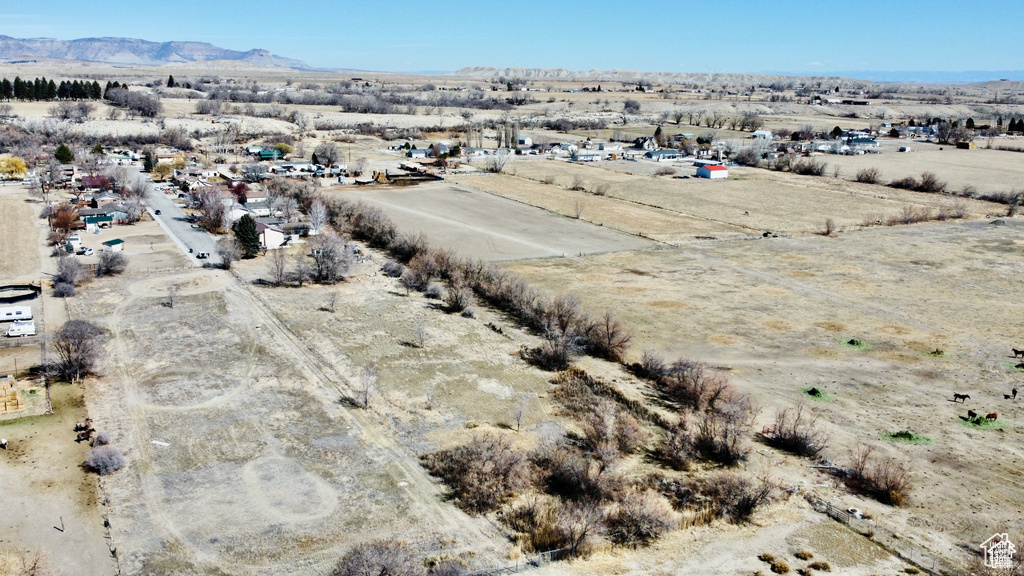 Overview of rural landscape featuring a desert landscape and mountains