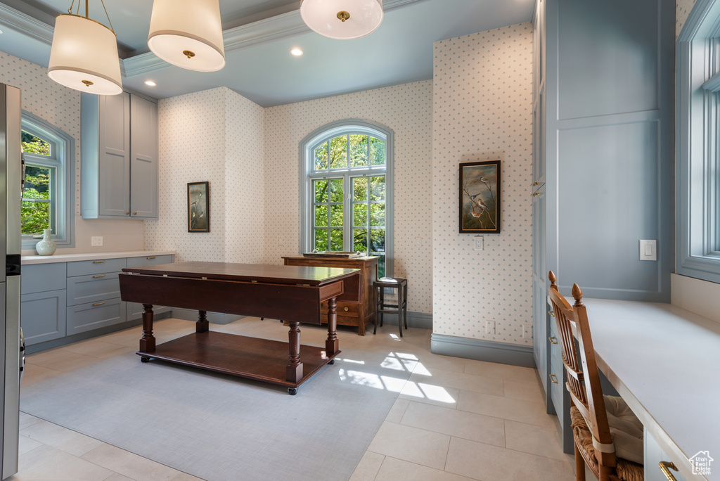 Home office featuring wallpapered walls, light tile patterned floors, baseboards, and recessed lighting