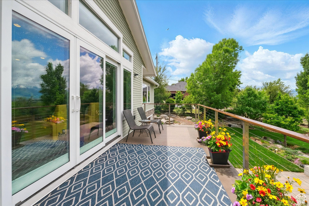 Balcony featuring french doors