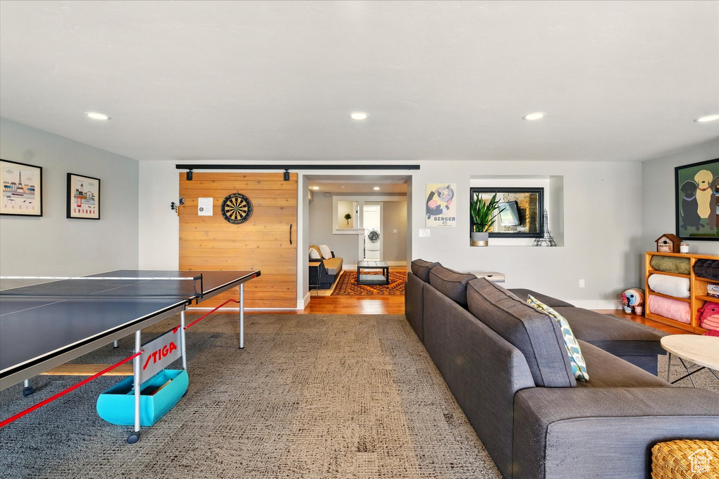 Playroom with recessed lighting and wood finished floors