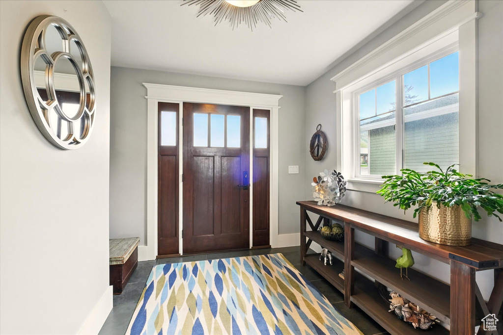 Foyer featuring baseboards