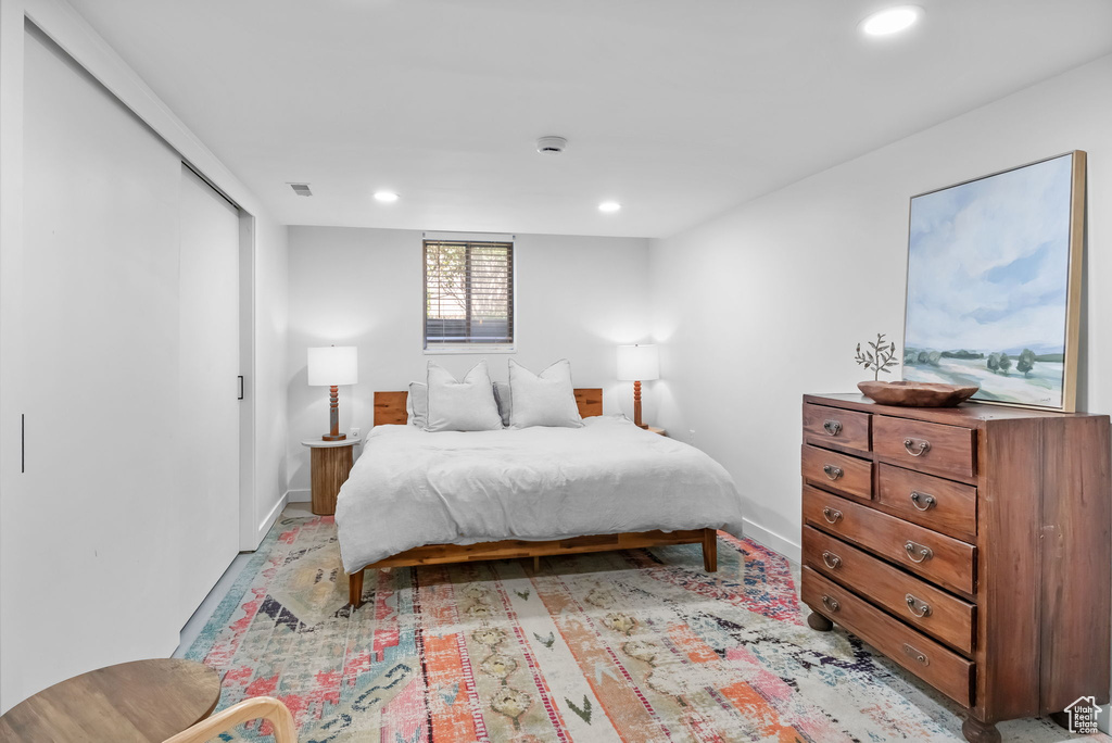 Bedroom featuring recessed lighting and baseboards