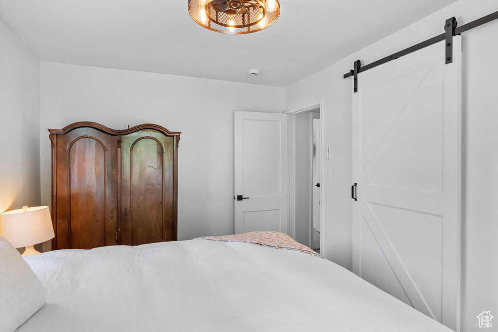 Bedroom with a barn door