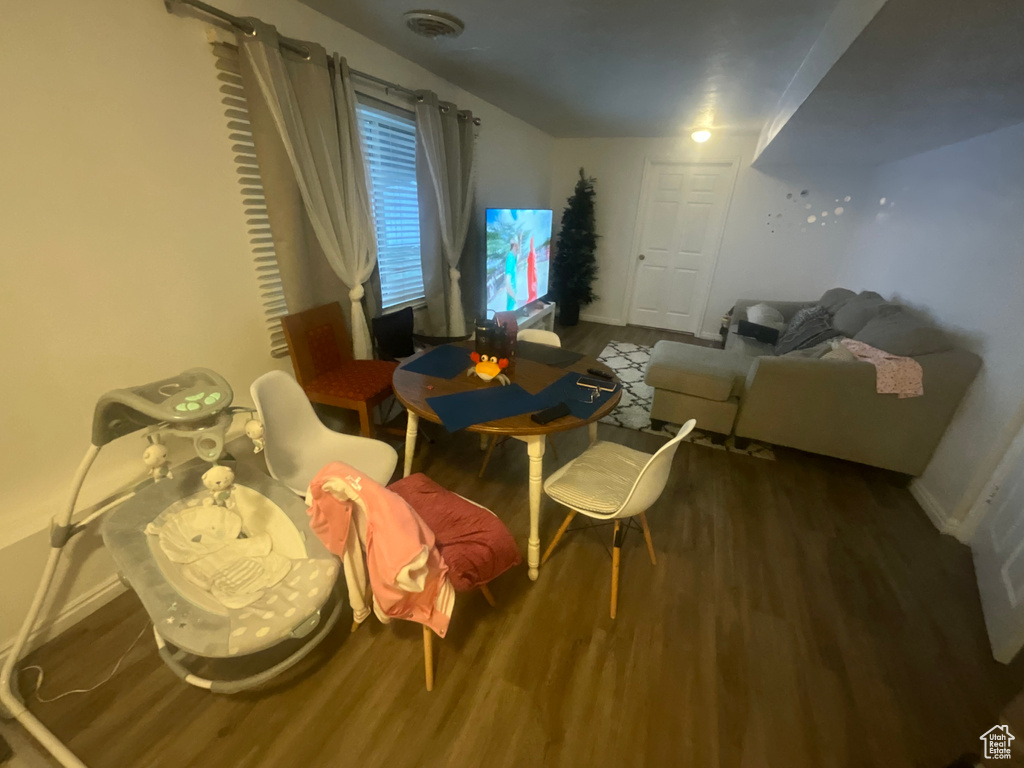 Sitting room featuring wood finished floors and baseboards