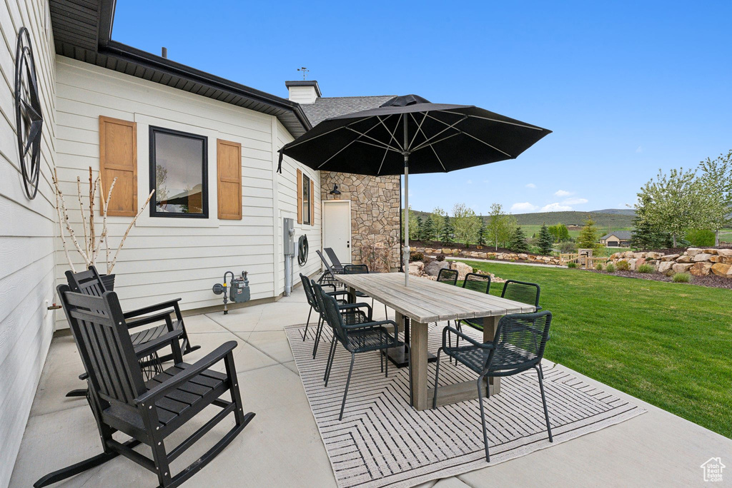 View of patio with outdoor dining space