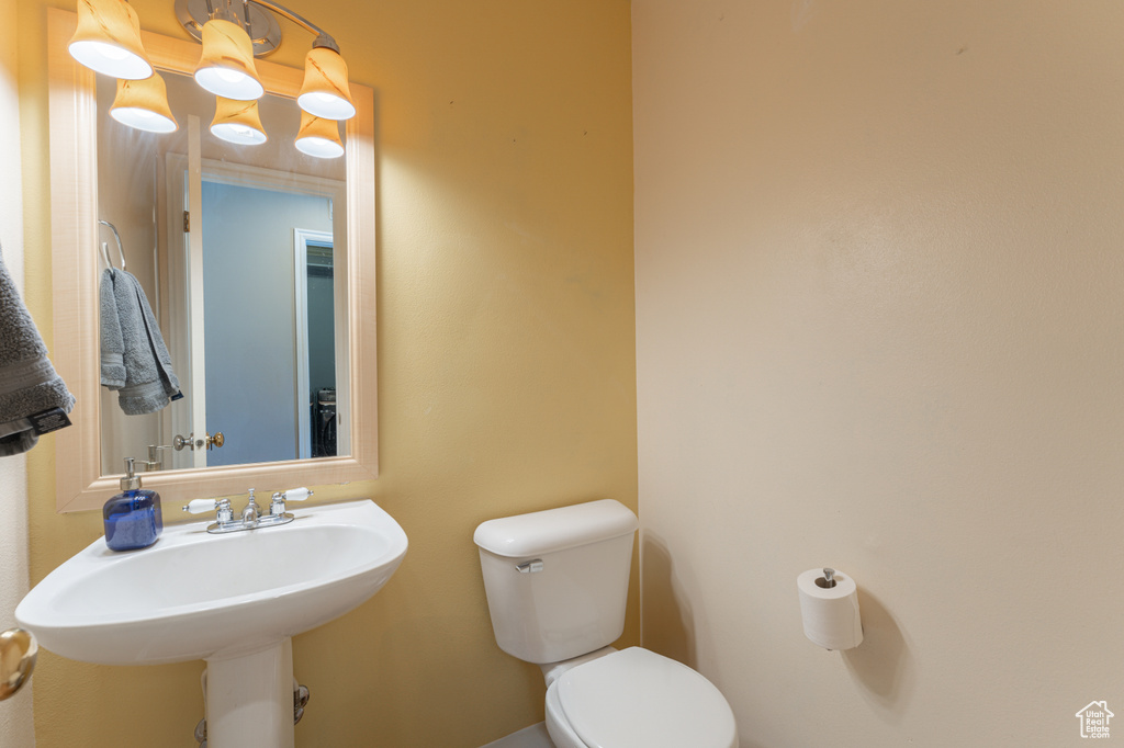 Bathroom featuring toilet and a sink