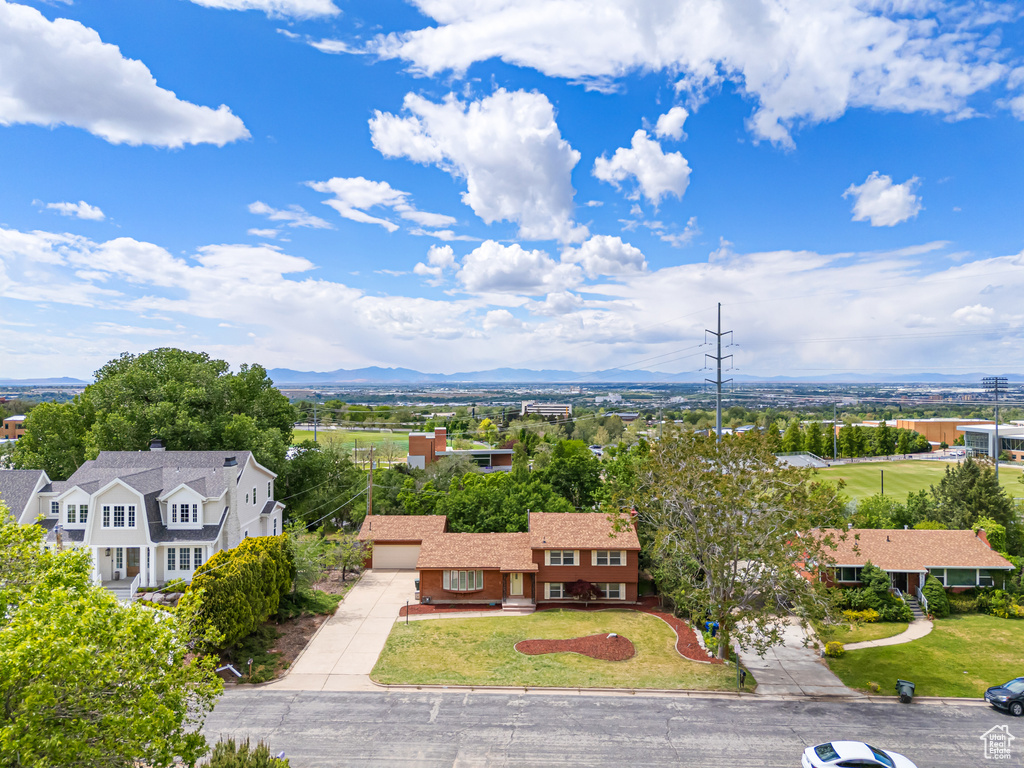 View of subject property with mountains