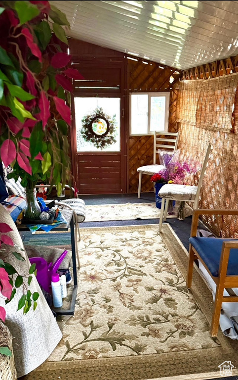 Sunroom / solarium with vaulted ceiling