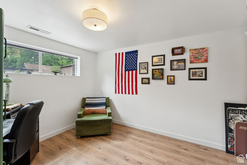 Office area featuring light wood finished floors and baseboards
