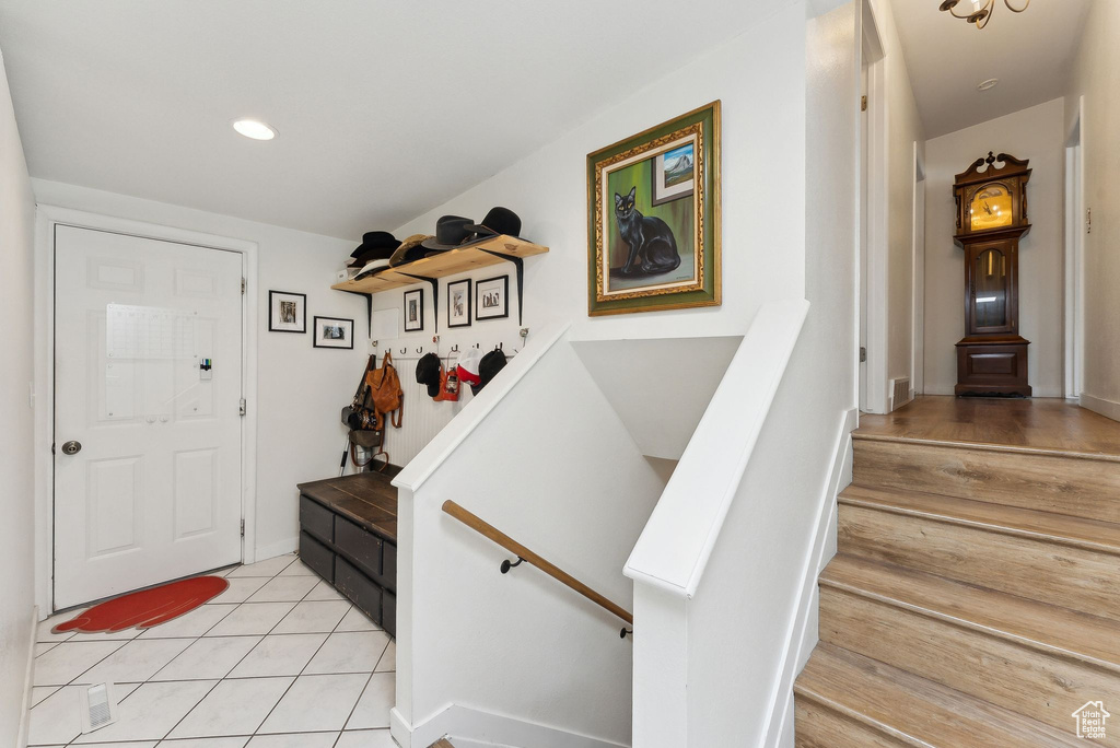 Foyer featuring light tile patterned floors