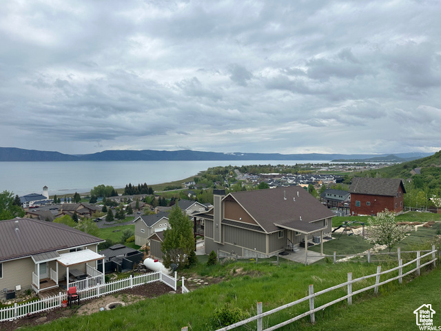 View of mountain backdrop with a nearby body of water