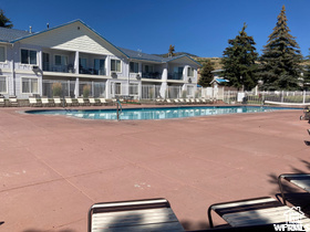 Community pool with fence