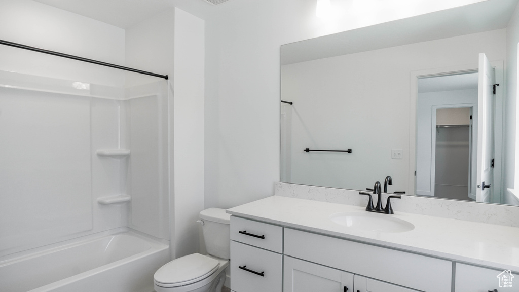 Full bathroom featuring vanity and shower / tub combination