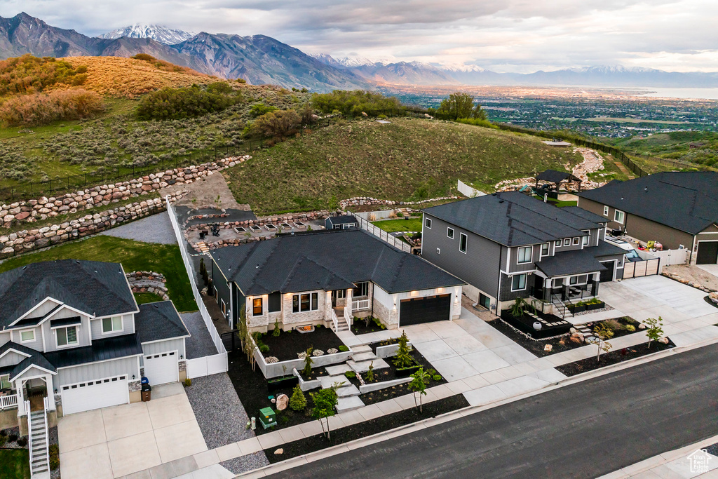Aerial view of residential area with a mountainous background