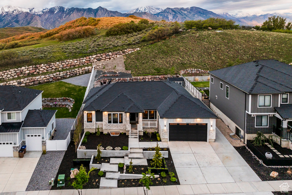 Aerial view of residential area with a mountain backdrop
