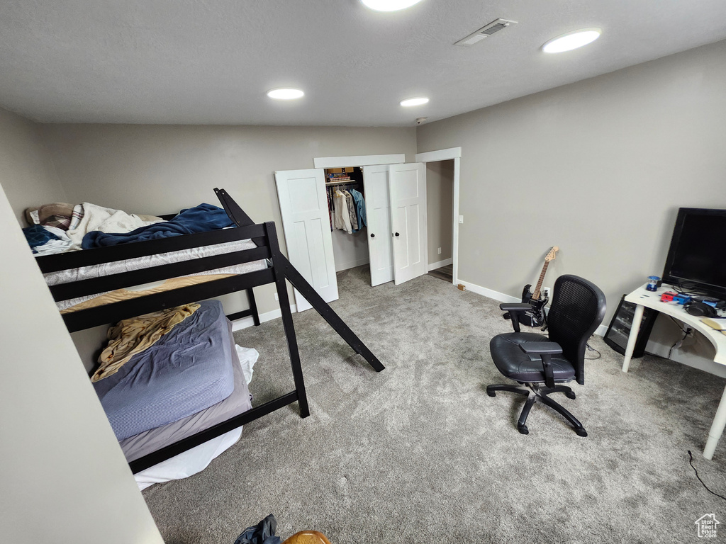 Bedroom featuring carpet flooring, recessed lighting, and baseboards