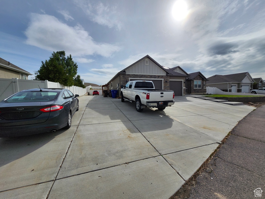 View of concrete road featuring a residential view