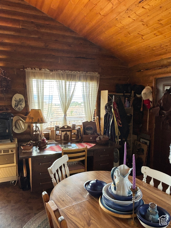 Dining room with vaulted ceiling and wooden ceiling