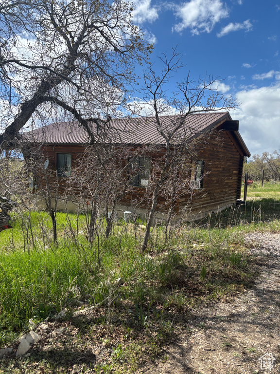 View of home\\\\\\\'s exterior featuring metal roof