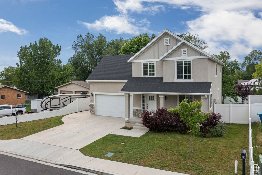 View of front of home with a porch, stucco siding, concrete driveway, an attached garage, and a shingled roof