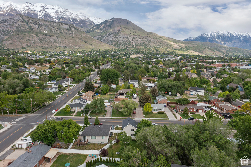 View of property location with a mountainous background and nearby suburban area