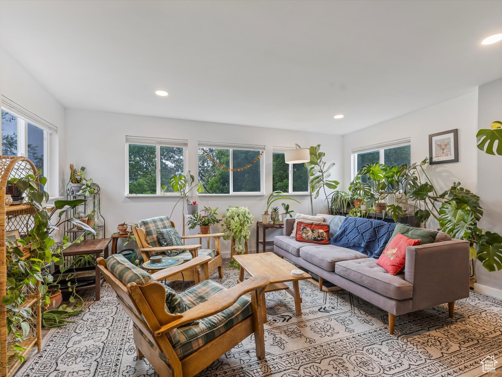 Living area featuring recessed lighting and baseboards