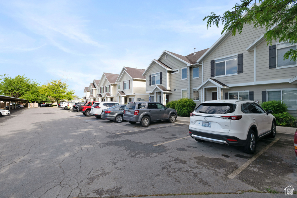 Uncovered parking lot with a residential view