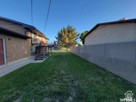 View of yard with stairway