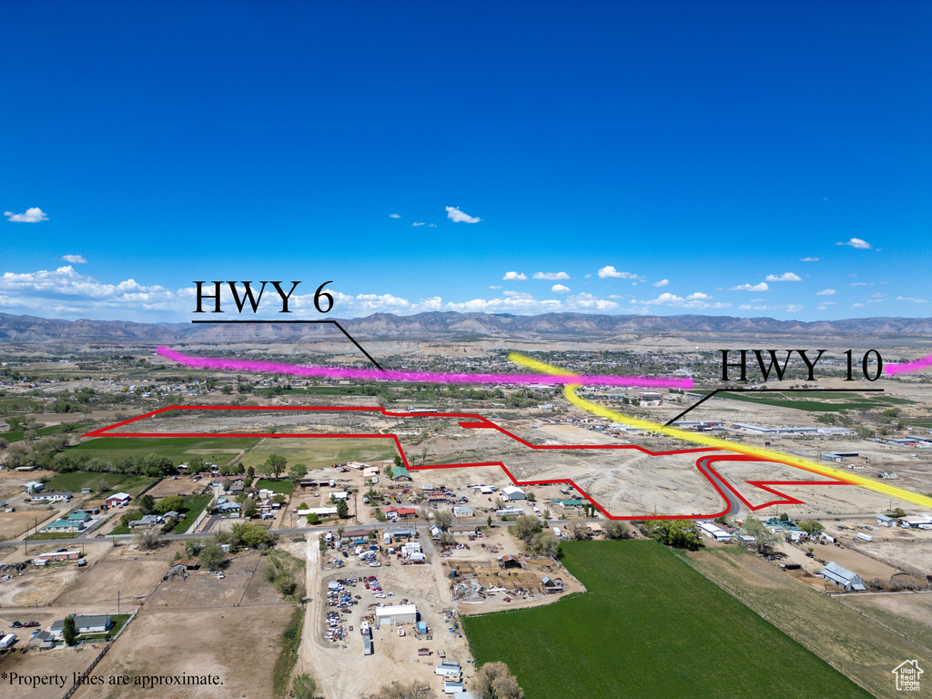 View of property location with a mountain backdrop and property parcel outlined