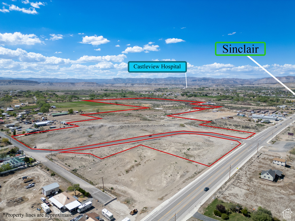 Aerial overview of property\\\\\\\\\\\\\\\\\\\\\\\\\\\\\\\\\\\\\\\\\\\\\\\\\\\\\\\\\\\\\\\'s location featuring a mountainous background and property boundaries highlighted